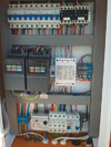 A motor control panel jointly designed by PTS, showing a PTS-developed logic controller with integrated GSM capabilities.